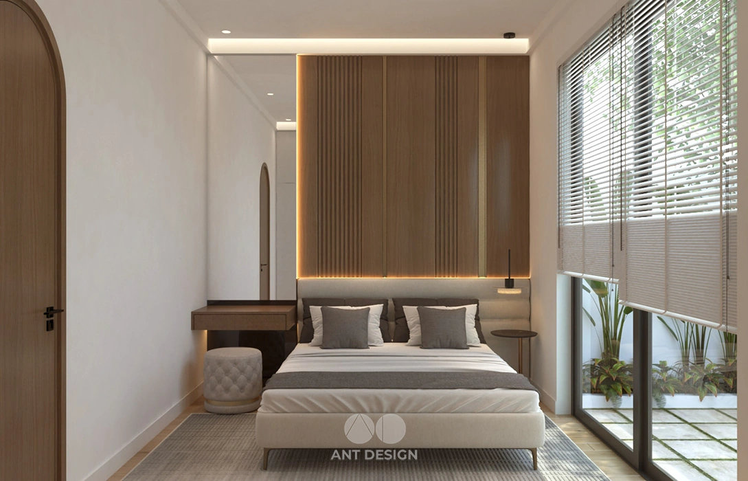 Góc trang điểm và cửa sổ lớn trong phòng ngủ