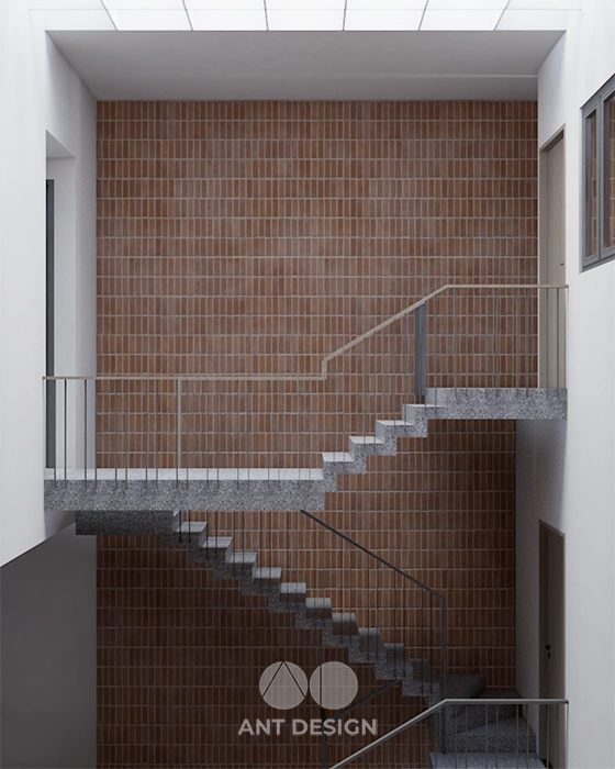 Cầu thang xương cá ốp gạch đỏ mộc giếng trời lấy sáng