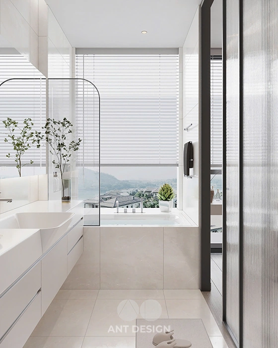 Bồn tắm nằm đặt cạnh cửa sổ kính thư giãn